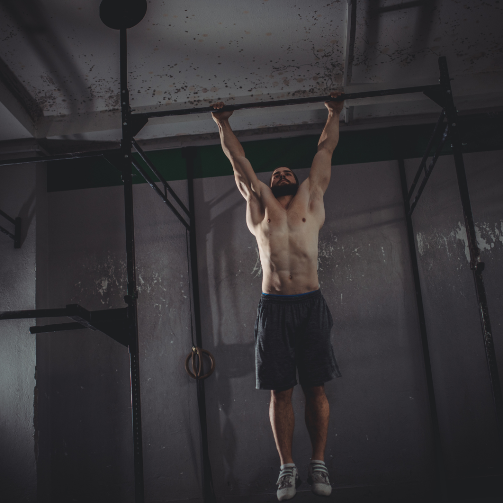 a guy performing pull ups